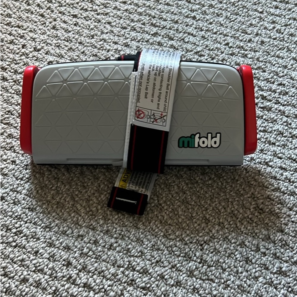 Mifold portable child booster seat